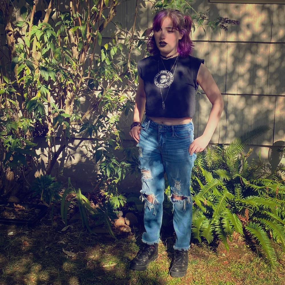 Distressed blue jeans